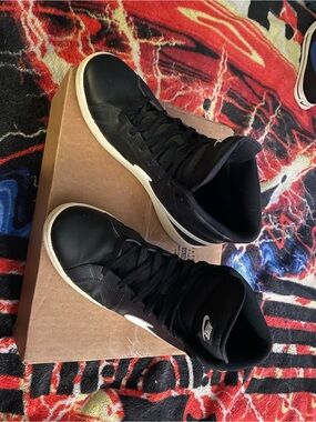 Nike Black High-Top Sneakers with White Sole